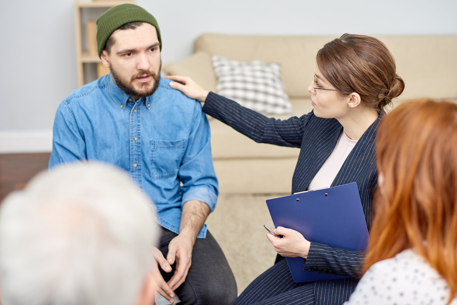 Sad Participant of Group Therapy Session